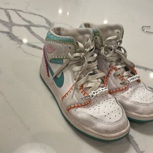 Gently worn girls high top Nike air Jordan stitched sneakers size 6.5 kids